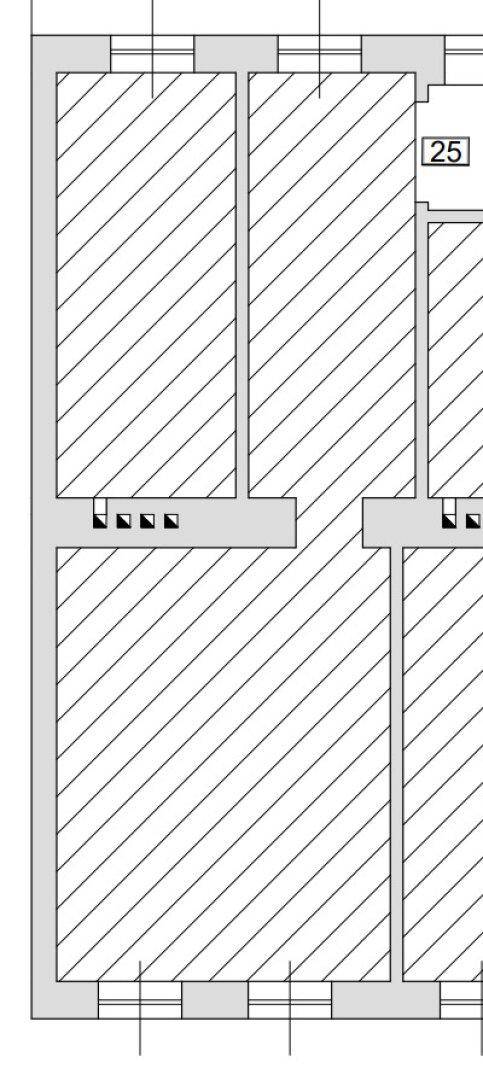 Ausschnitt eines Grundrisses mit schraffierten Flächen, der die Raumaufteilung zeigt.