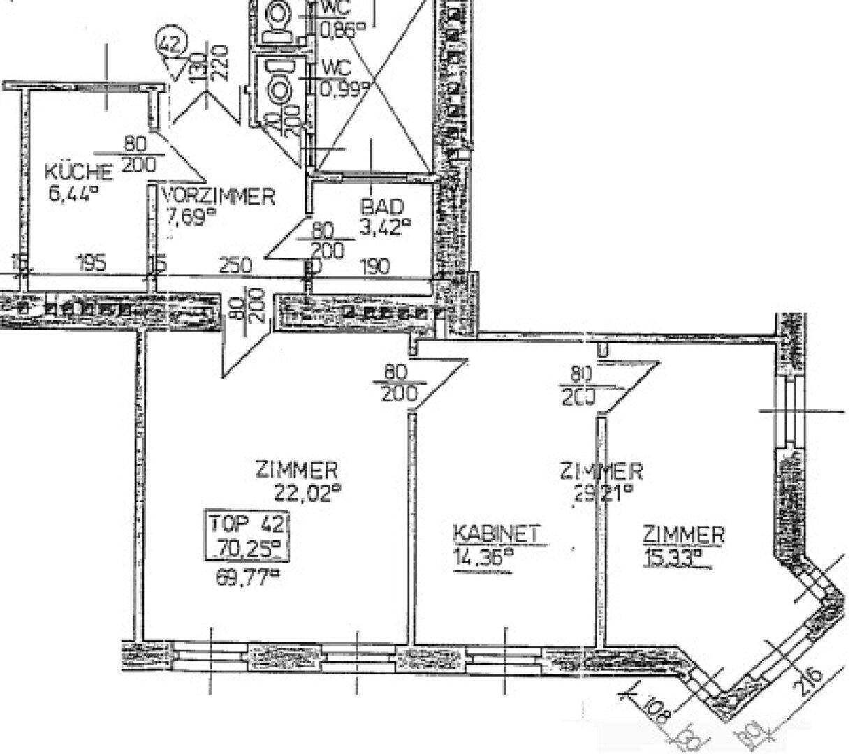 Grundriss einer Wohnung mit Küche, Vorzimmer, Bad, WC und drei Zimmern.
