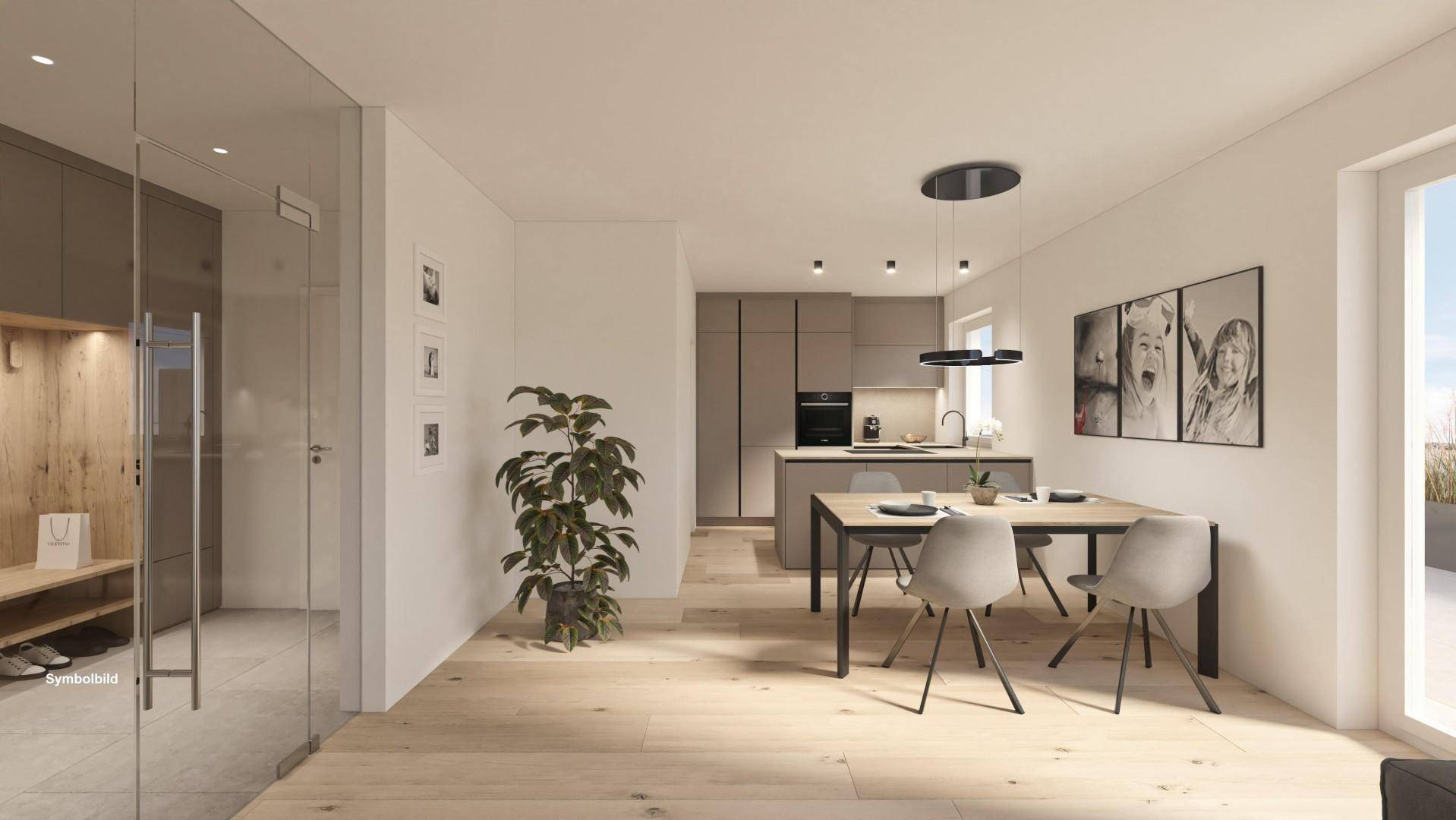 Moderner Eingangsbereich mit Glaswand, Garderobe und Blick in den offenen Wohnbereich.