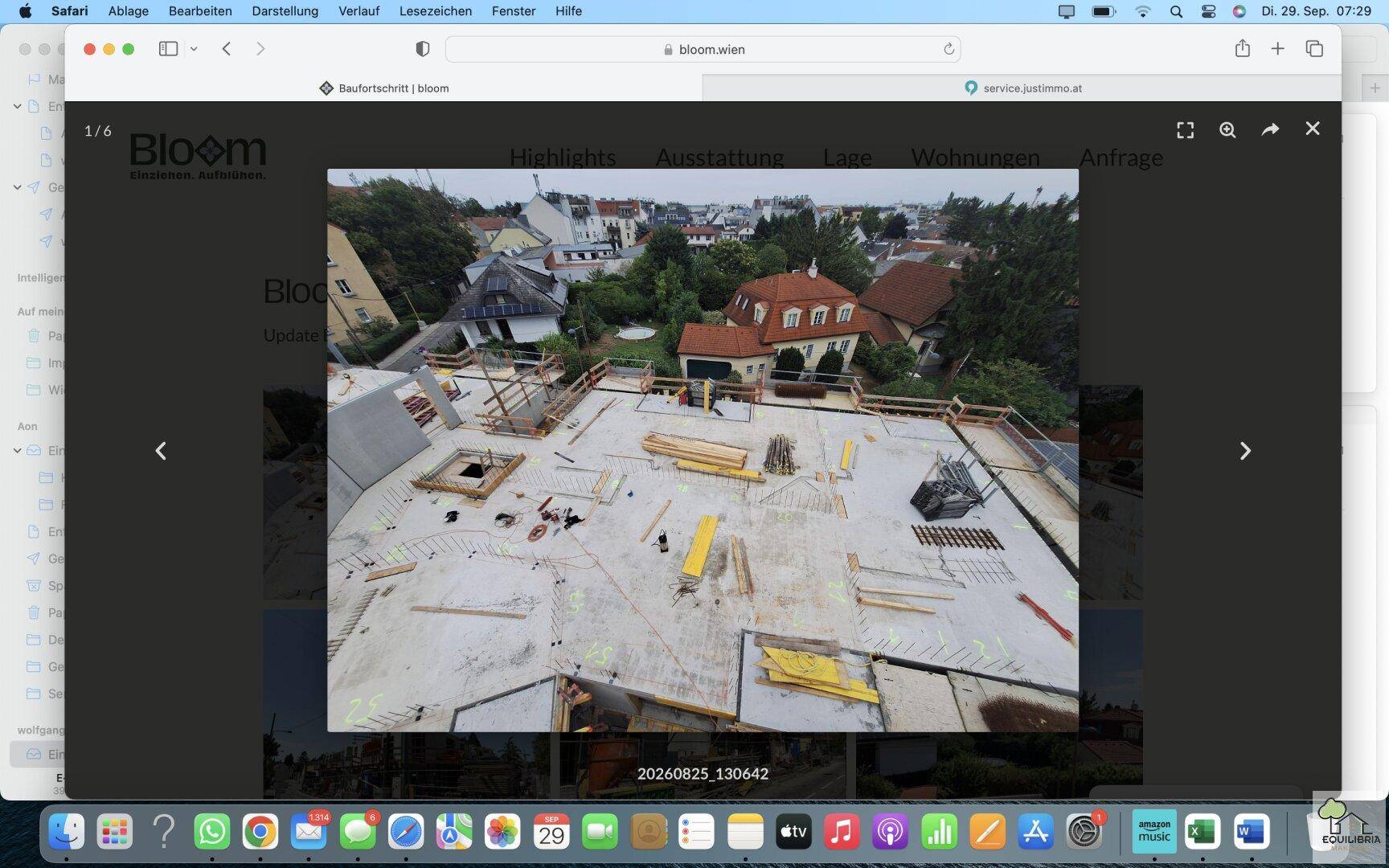 Screenshot einer Webseite mit einer Luftaufnahme einer Baustelle und umliegenden Gebäuden.
