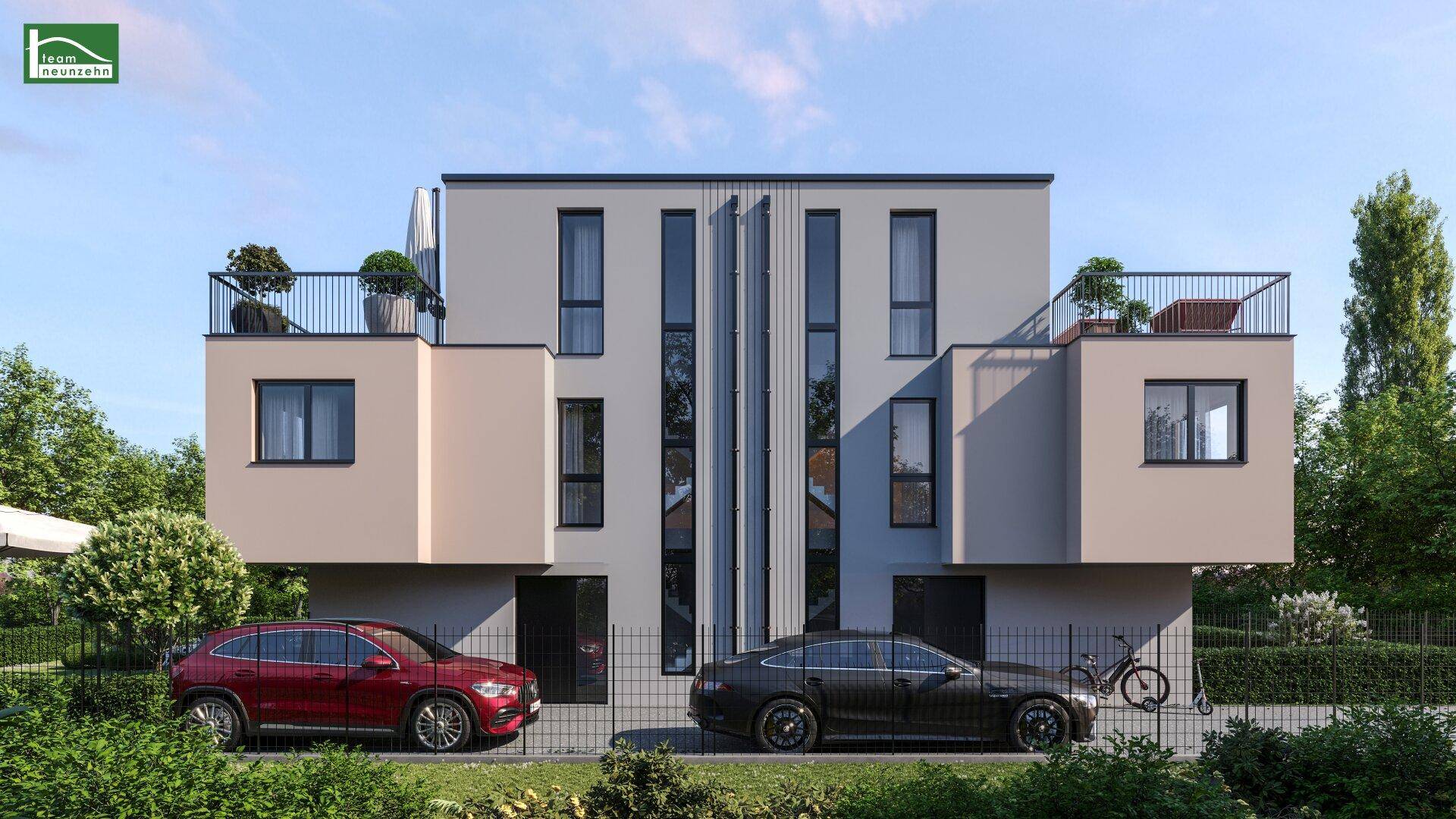 Moderne Fassade eines Doppelhauses mit klaren Linien und großen Fenstern.