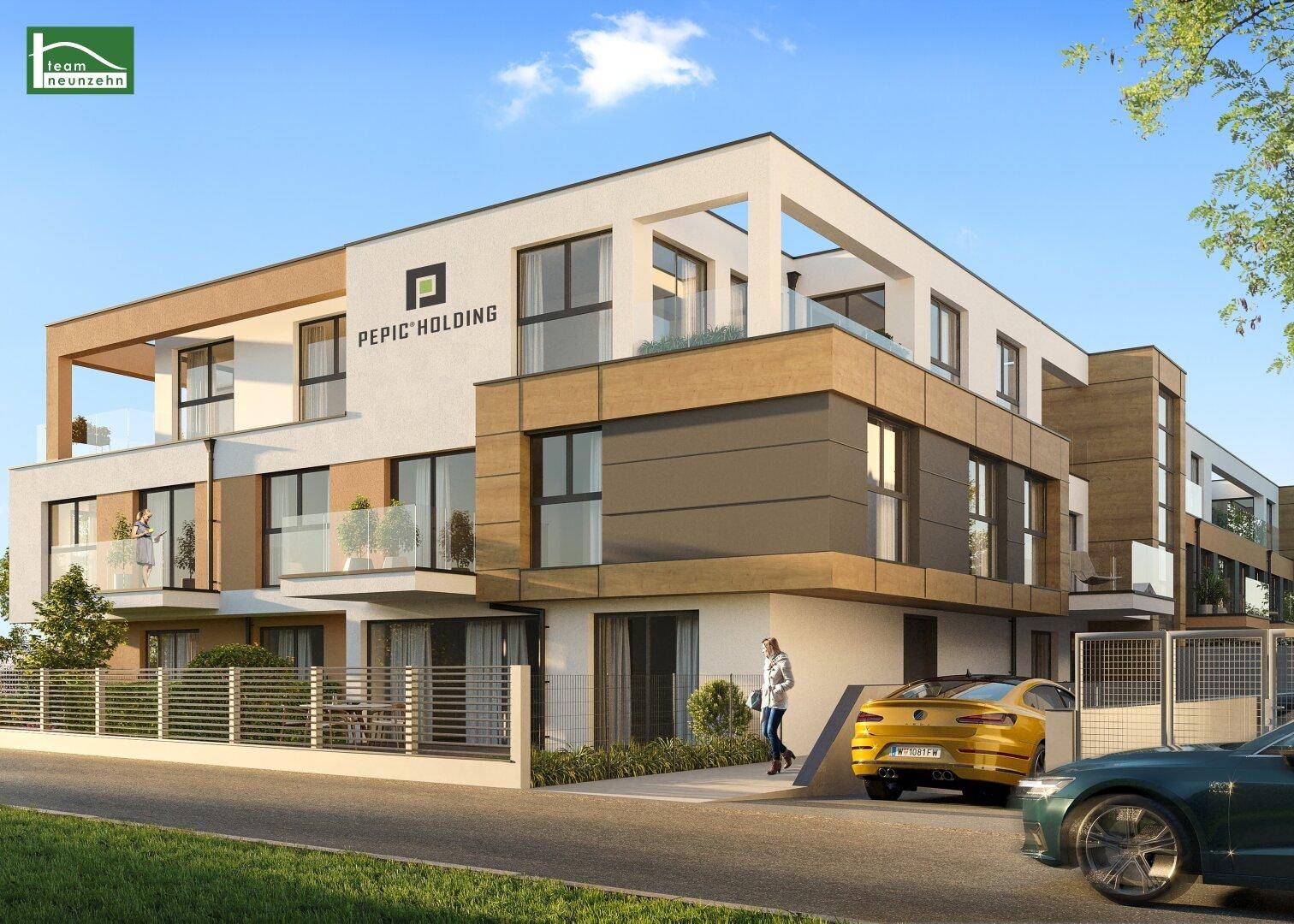 Ansicht eines modernen Mehrfamilienhauses mit zeitgenössischer Architektur und Parkmöglichkeiten.