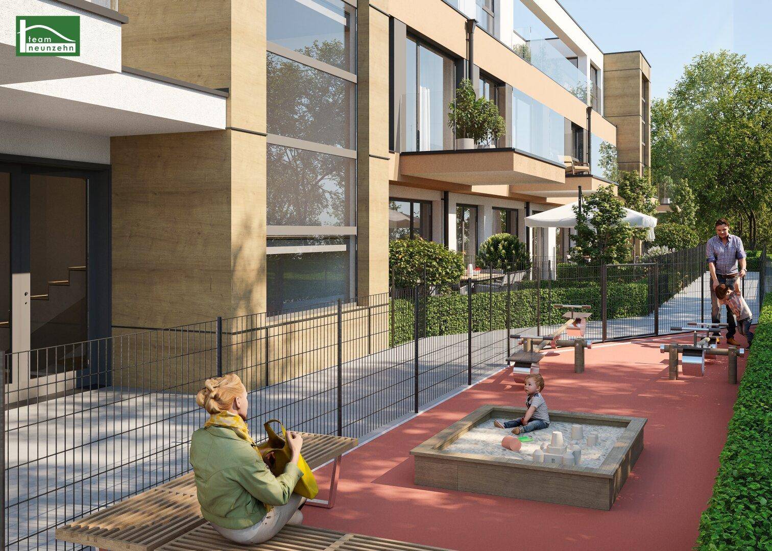 Kinderspielplatz mit Sandkasten und Sitzgelegenheiten, umgeben von Grünflächen für Familien.
