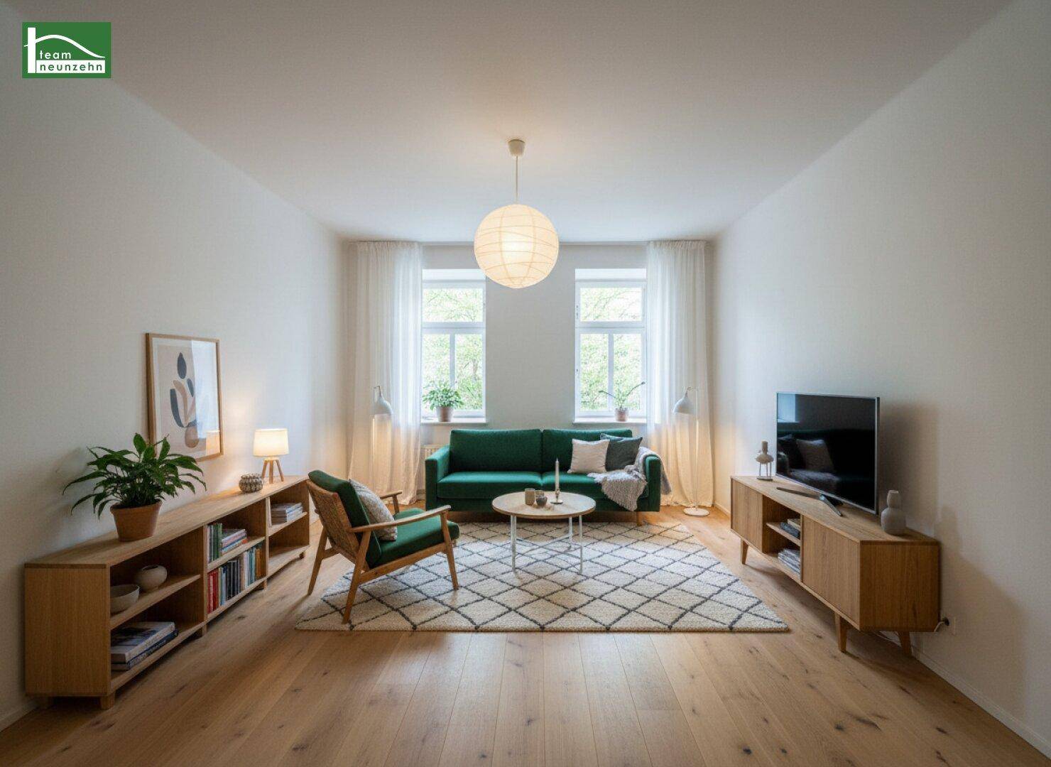 Helles, modern eingerichtetes Wohnzimmer mit Holzboden, grüner Couch und Teppich.