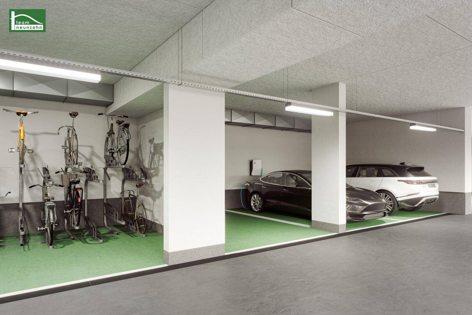 Tiefgarage mit Stellplätzen, Fahrradabstellbereich und Ladestationen für Elektrofahrzeuge.