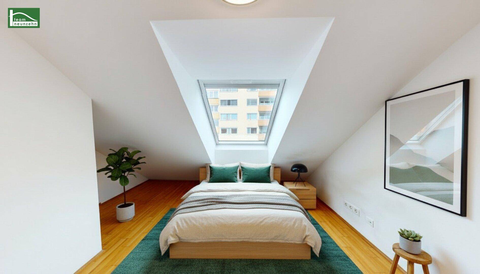 Gemütliches Schlafzimmer im Dachgeschoss mit großem Dachfenster und Holzboden.