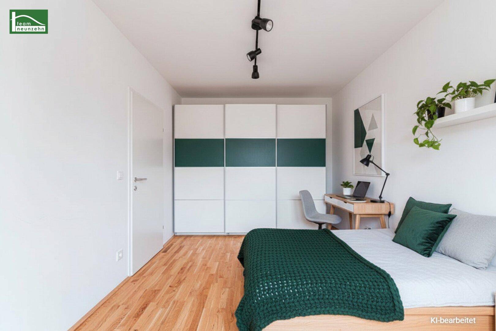Gemütliches Schlafzimmer mit Holzboden, modernem Kleiderschrank und Schreibtisch.