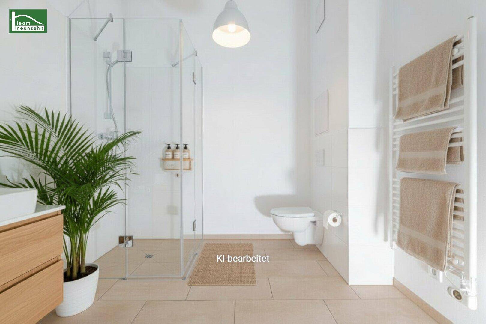 Helles Badezimmer mit moderner Dusche, Waschtisch, Wand-WC und beheiztem Handtuchhalter.