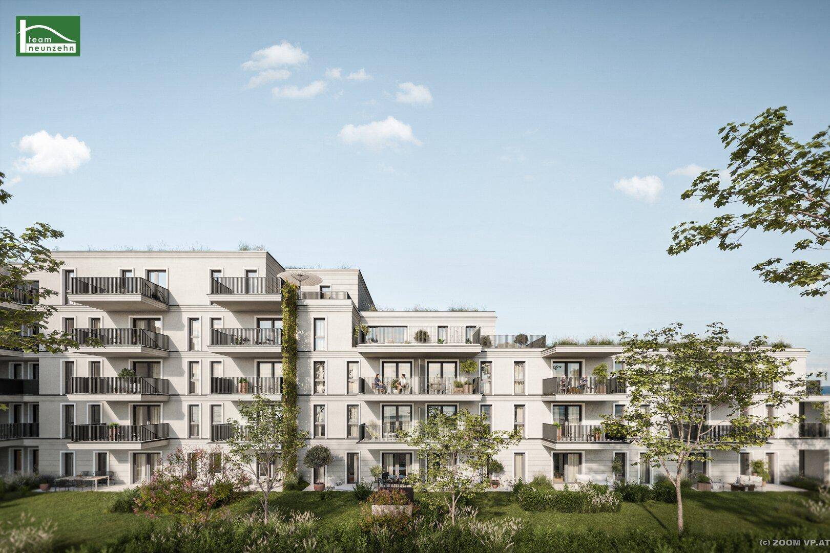 Moderne Wohnanlage mit gestufter Architektur, zahlreichen Balkonen und begrünten Außenbereichen.