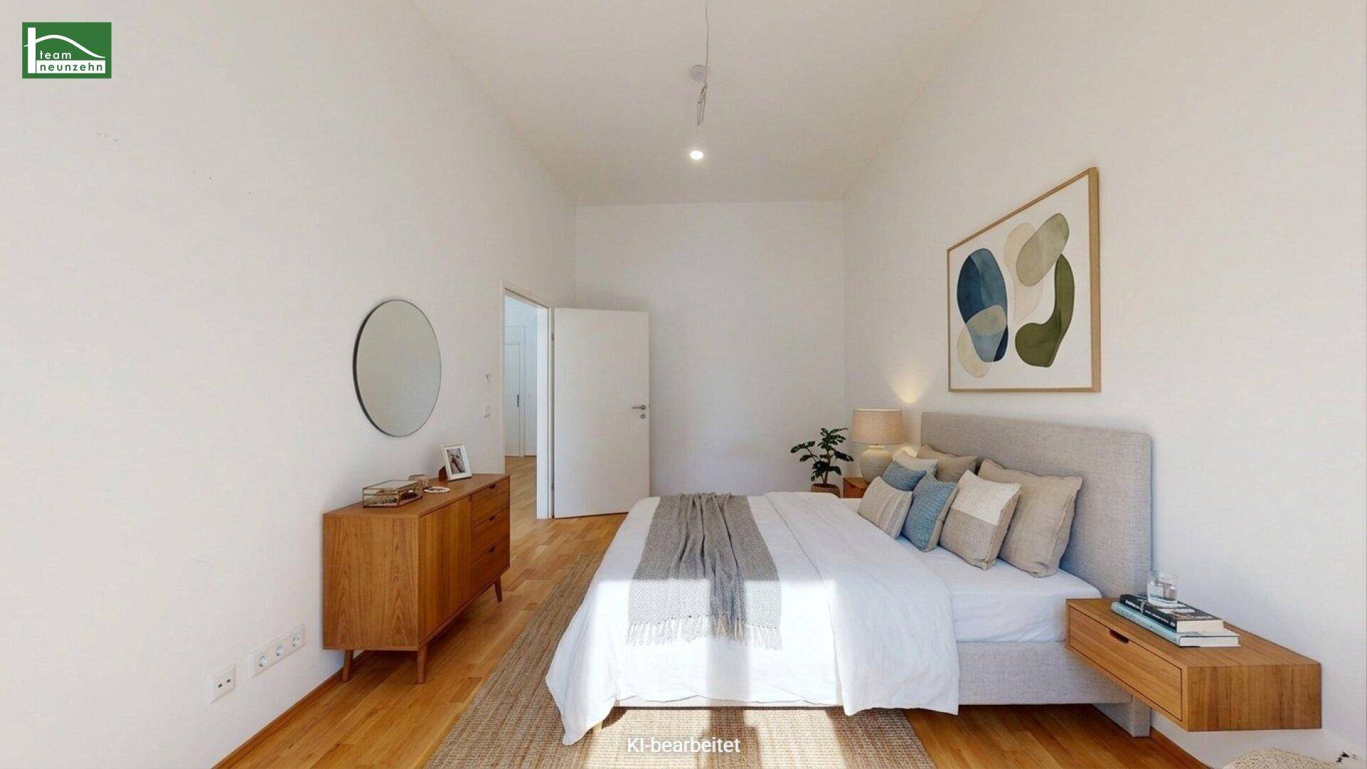 Modern eingerichtetes Schlafzimmer mit Parkettboden und stilvoller Dekoration.
