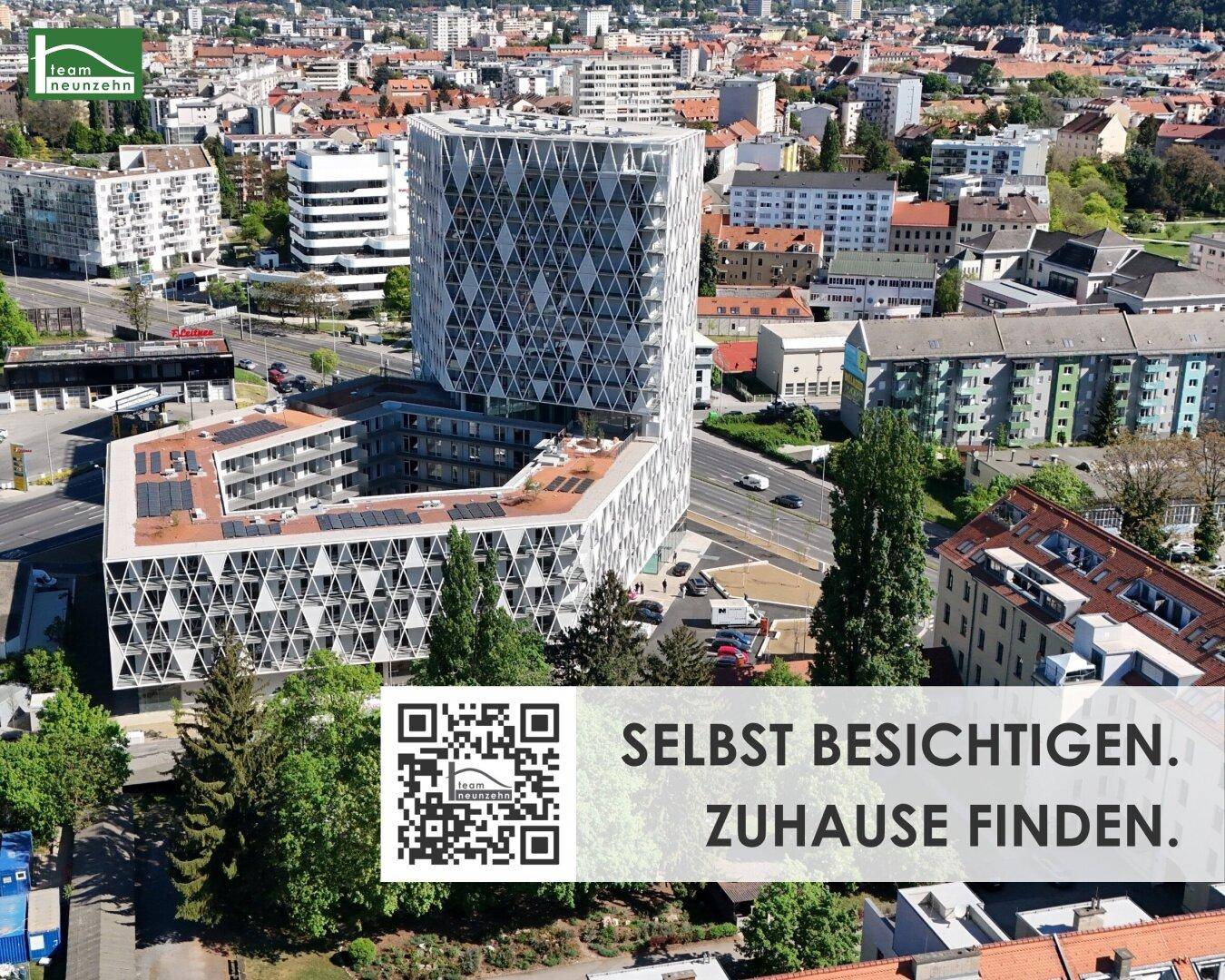 Luftaufnahme eines modernen Gebäudekomplexes mit markanter Architektur und städtischem Umfeld in Graz.