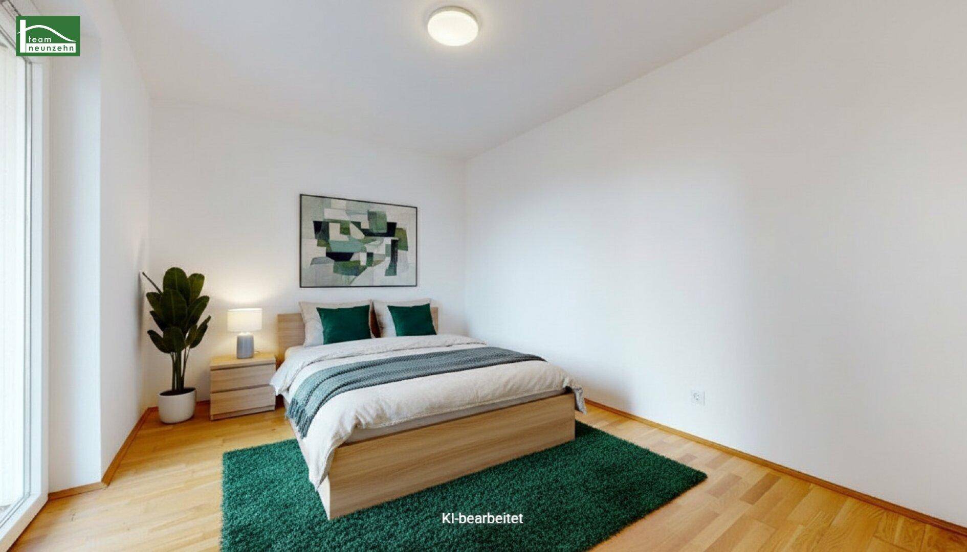Modern eingerichtetes Schlafzimmer mit Holzboden, grünem Teppich und minimalistischem Design.