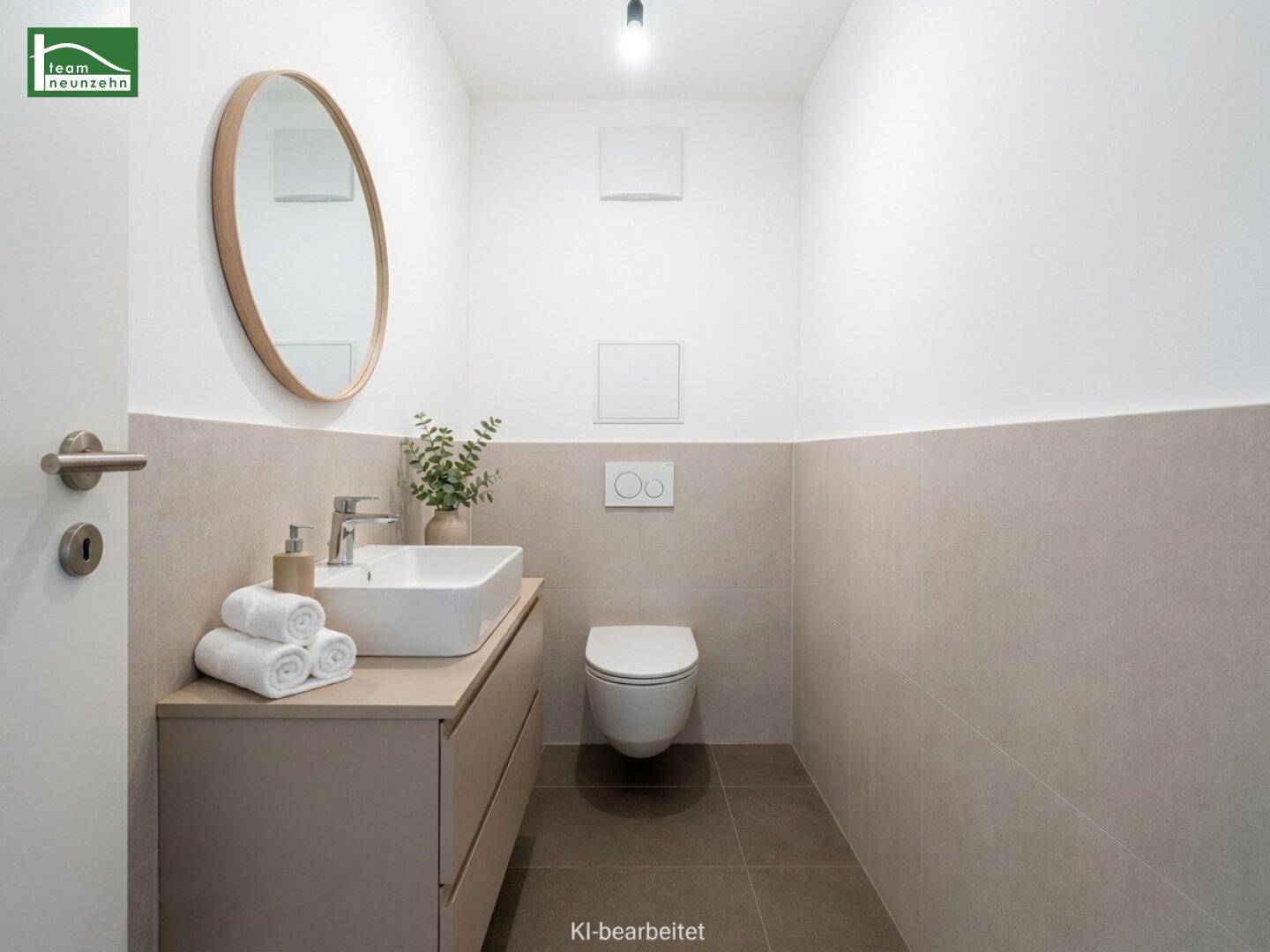 Modernes Gäste-WC mit stilvollem Waschbecken und wandhängender Toilette.