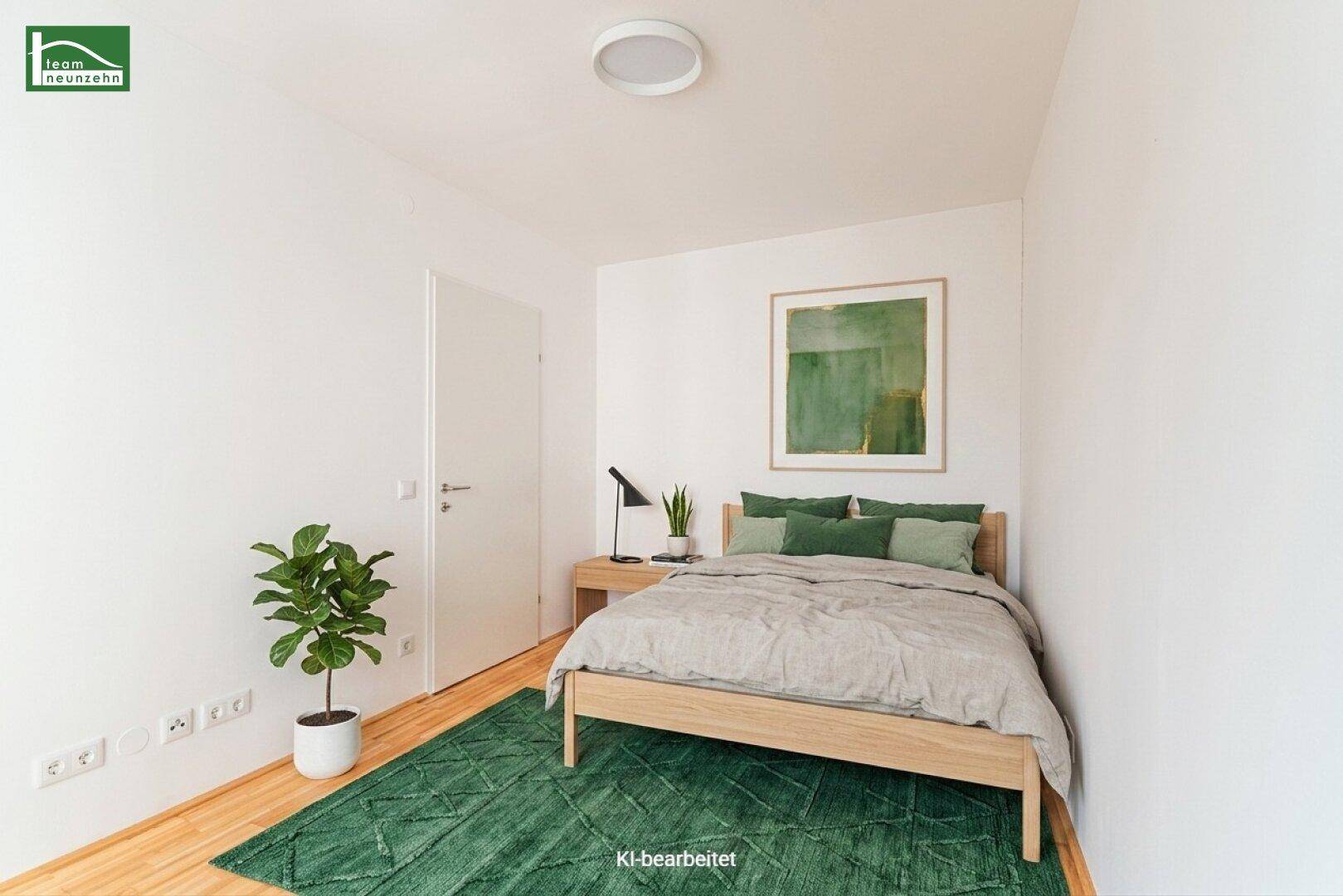 Helles Schlafzimmer mit Holzbett, grünem Teppich und Parkettboden, modern und minimalistisch eingerichtet.