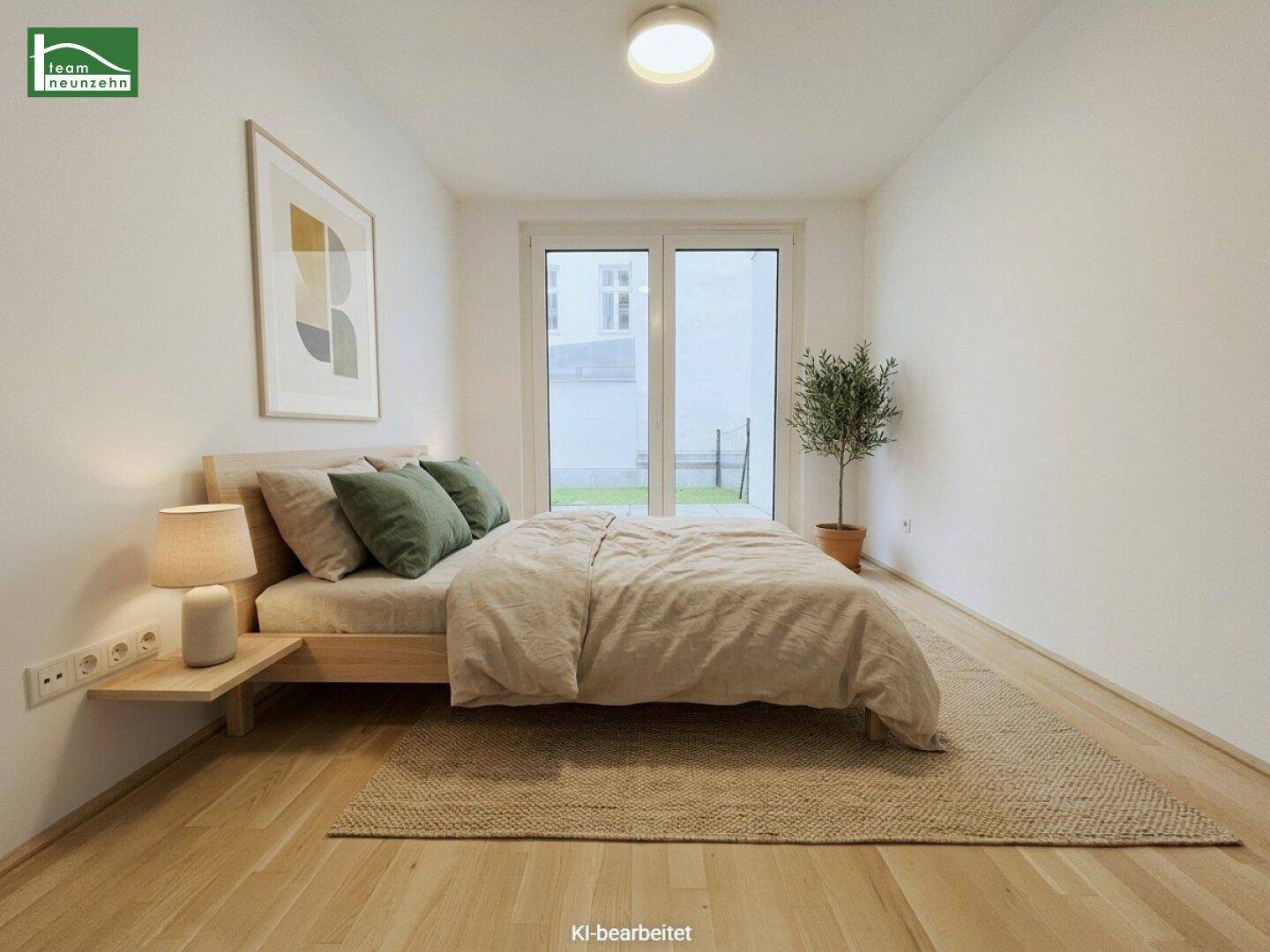 Modernes Schlafzimmer mit Parkettboden und direktem Zugang zum privaten Garten.