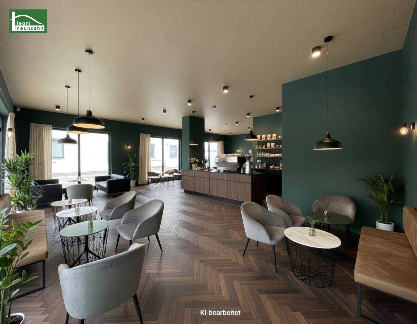 Gemütlicher Loungebereich in einem modernen Café mit bequemen Sesseln, Holzboden und Pflanzen.
