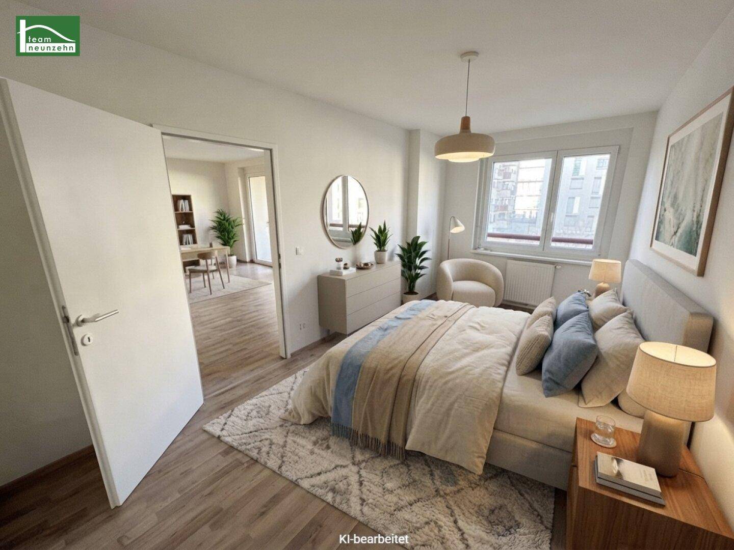 Gemütliches Schlafzimmer mit Doppelbett, Holzboden und Blick in einen weiteren Raum.