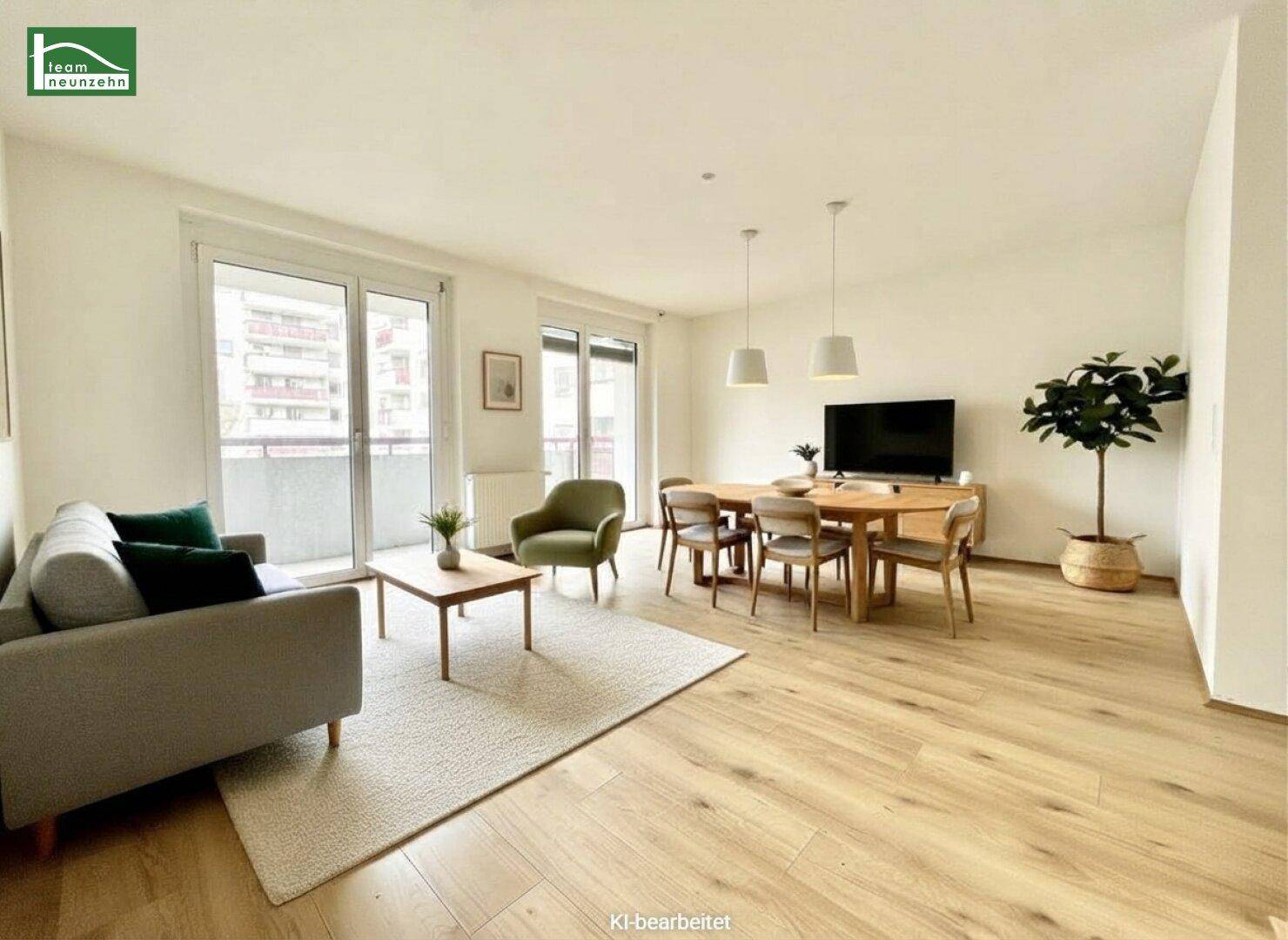 Heller offener Wohn-Essbereich mit modernem Design, Laminatboden und Zugang zu einem Balkon.