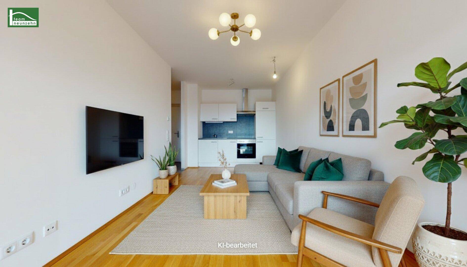 Gemütlicher Wohnbereich mit offener Küche, modernem Sofa und Holzboden, hell und einladend gestaltet.