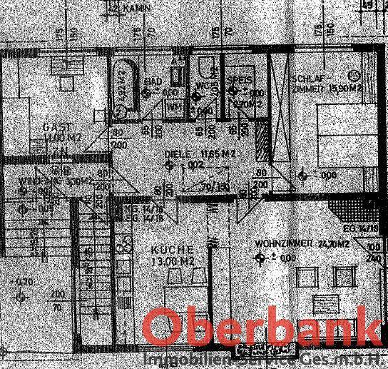 Grundriss des Erdgeschosses mit Küche, Wohnzimmer, Schlafzimmer und Bad.
