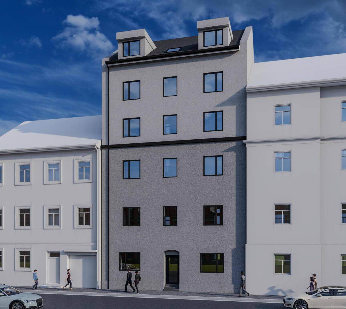 Moderne Gebäudefassade eines Mehrfamilienhauses mit vielen Fenstern und klaren Linien.