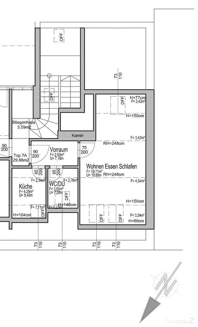 Grundrissplan einer Wohnung mit offenem Wohn-, Ess- und Schlafbereich sowie separater Küche und Bad.
