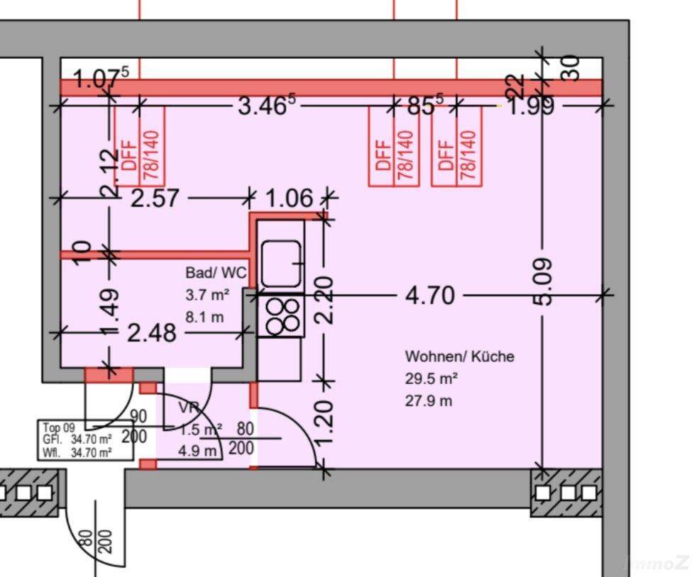 Grundriss einer Wohnung mit Bad/WC und offenem Wohn-/Küchenbereich.