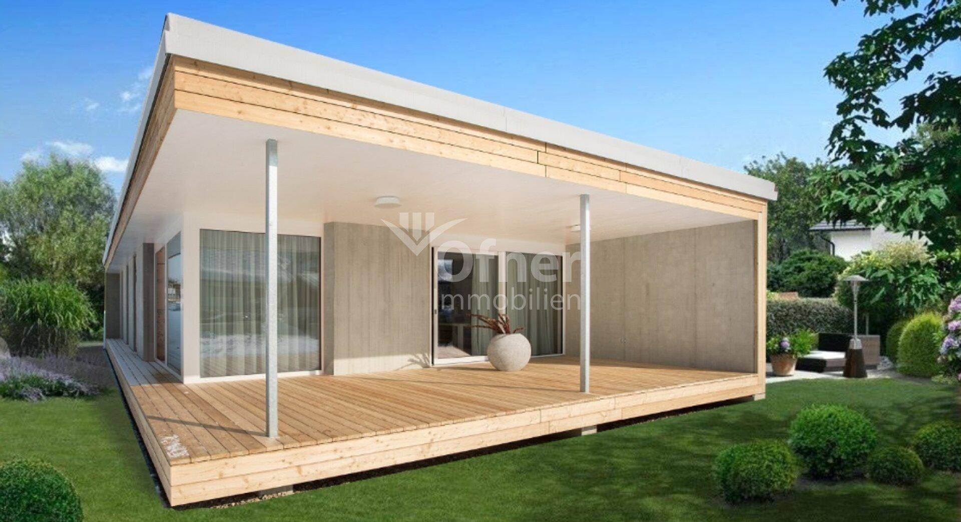 Modernes Einfamilienhaus mit Holzfassade, großer Terrasse und gepflegtem Garten.