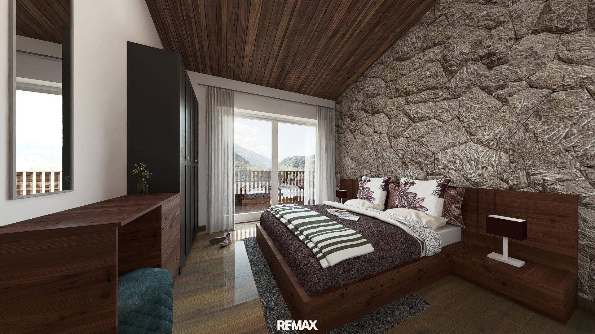 Gemütliches Schlafzimmer mit Holzboden, Steinwand und direktem Zugang zu einem Balkon mit schöner Aussicht.