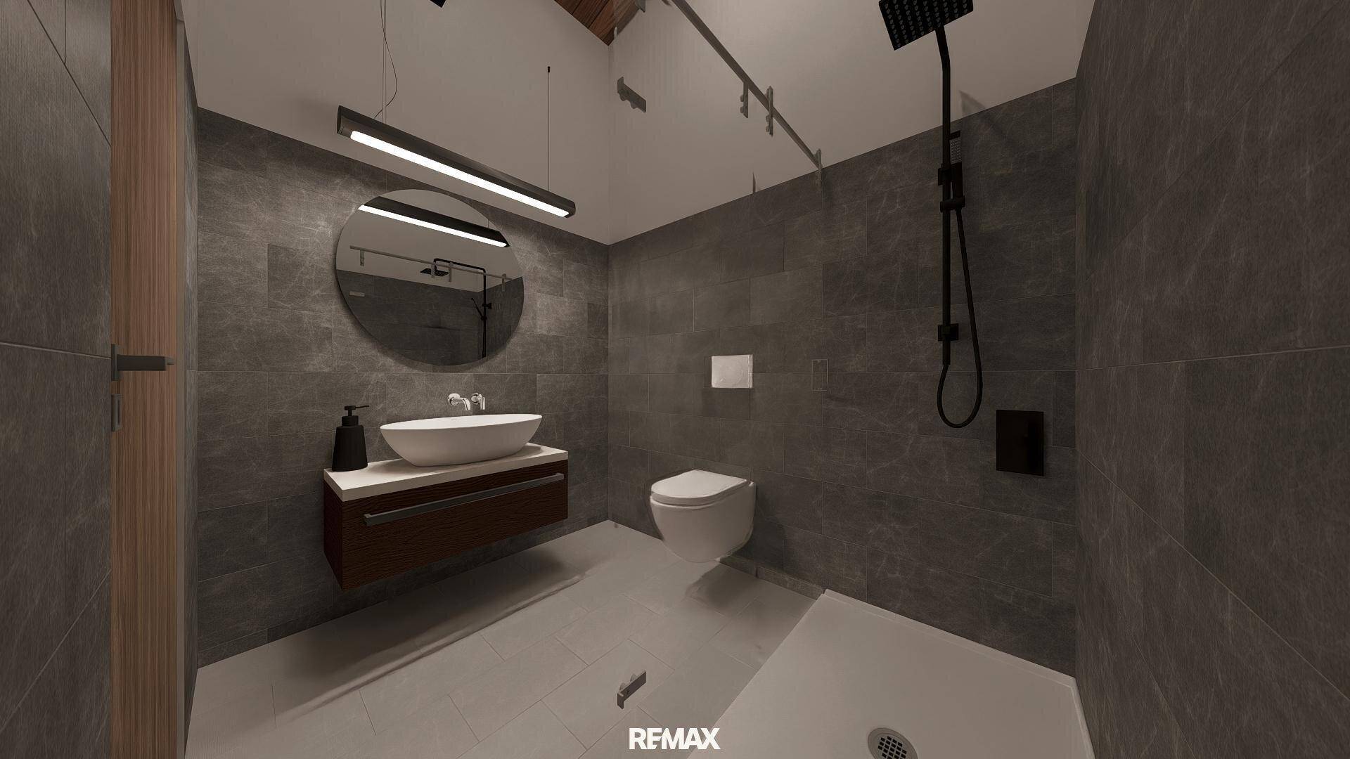 Modernes Badezimmer mit grauen Großformatfliesen, schwebendem Waschtisch und ebenerdiger Dusche mit Regenduschkopf.
