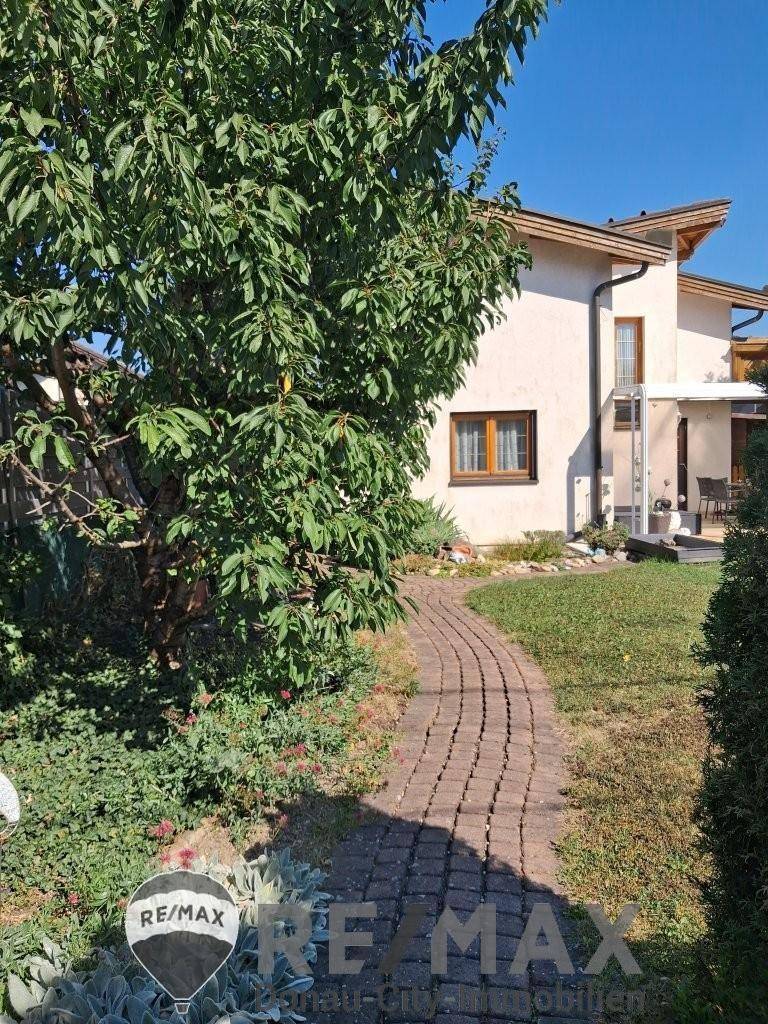 34 Gartenweg mit Haus 1210