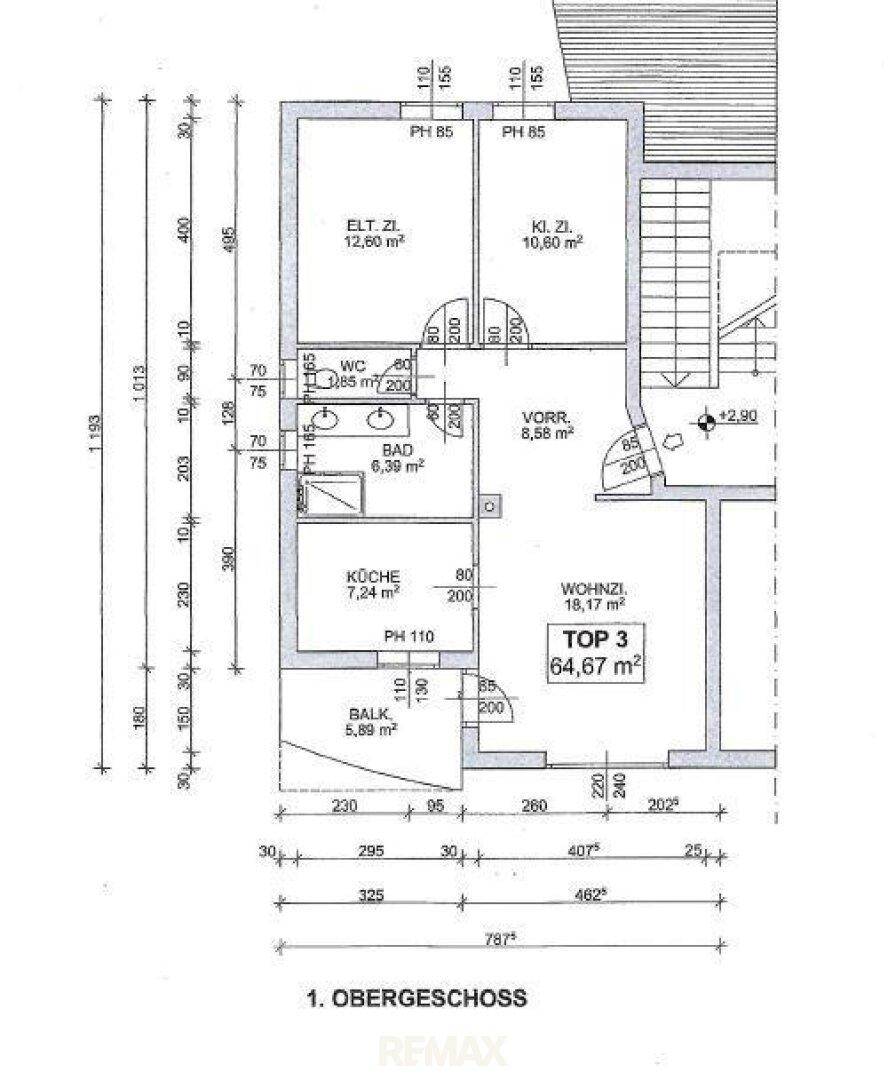 Grundriss des 1. Obergeschosses mit Wohnzimmer, Küche, Bad und zwei Schlafzimmern.
