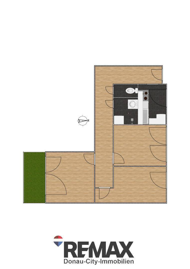 Klassischer Grundriss einer Wohnung mit Raumaufteilung, Kompass und Balkonbereich.