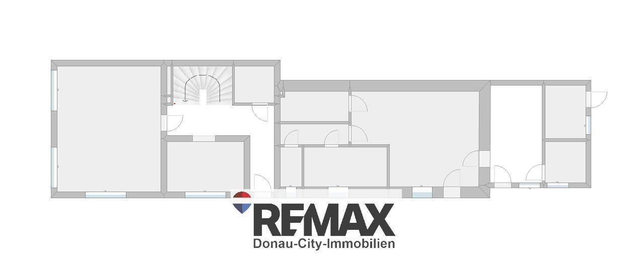 Grundrissplan einer Etage mit mehreren Räumen und einer Treppe.