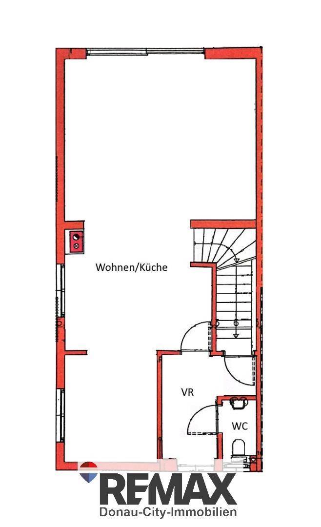 Grundriss des Erdgeschosses mit offenem Wohn-/Küchenbereich und separatem WC.