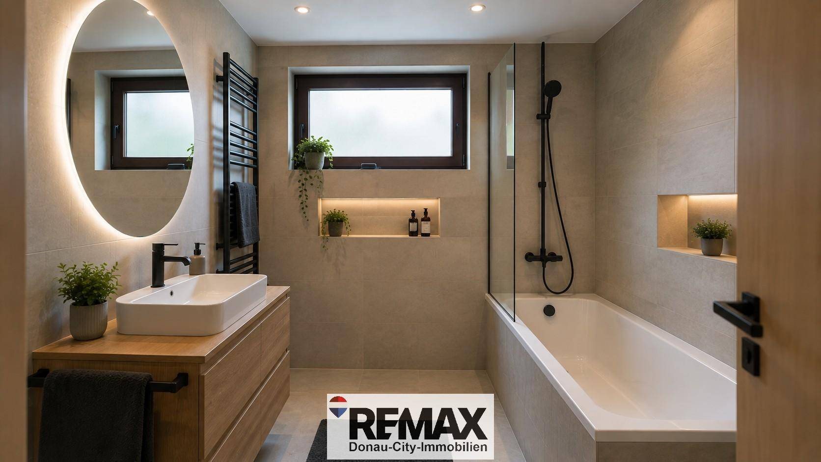 Modernes Badezimmer mit Badewanne, Dusche, Holzwaschtisch und beleuchtetem Spiegel.