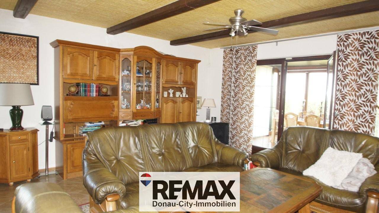 27 Wohnzimmer mit Wintergarten EG EFH 1220