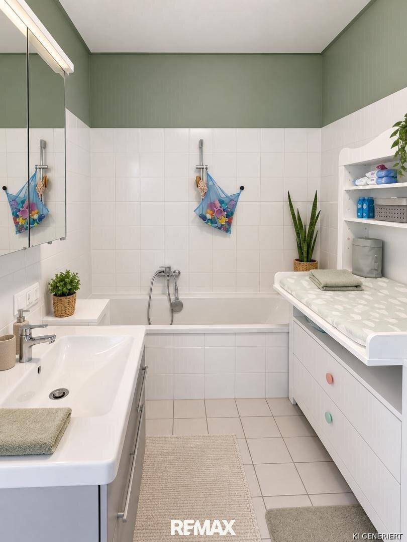 Badezimmer mit Badewanne, Waschbecken und Wickeltisch, ideal für Familien.