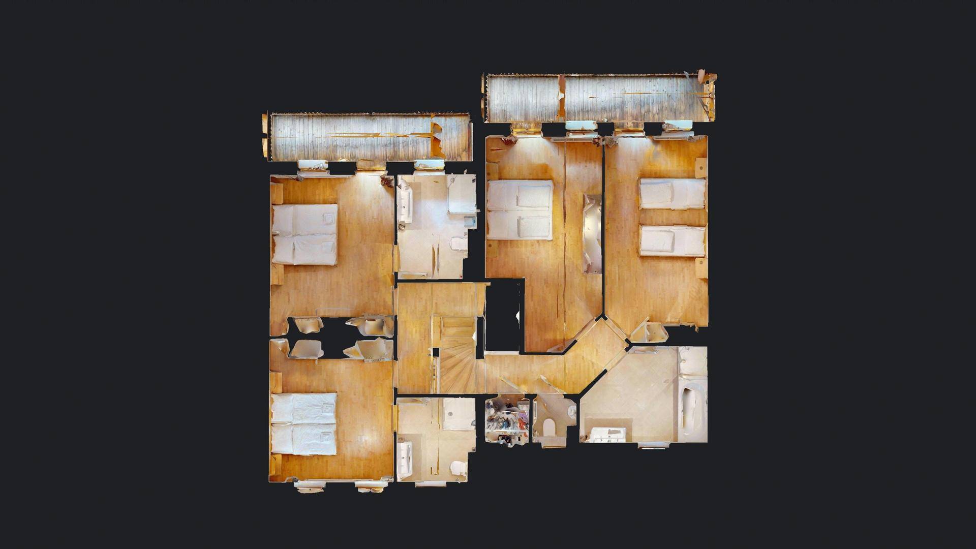 Grundriss des Obergeschosses mit mehreren Schlafzimmern und Bädern.