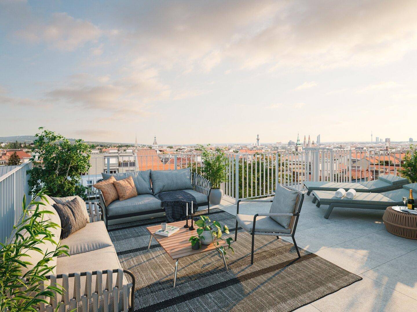 Großzügige Dachterrasse mit Lounge-Möbeln und weitem Blick über die Stadtlandschaft.