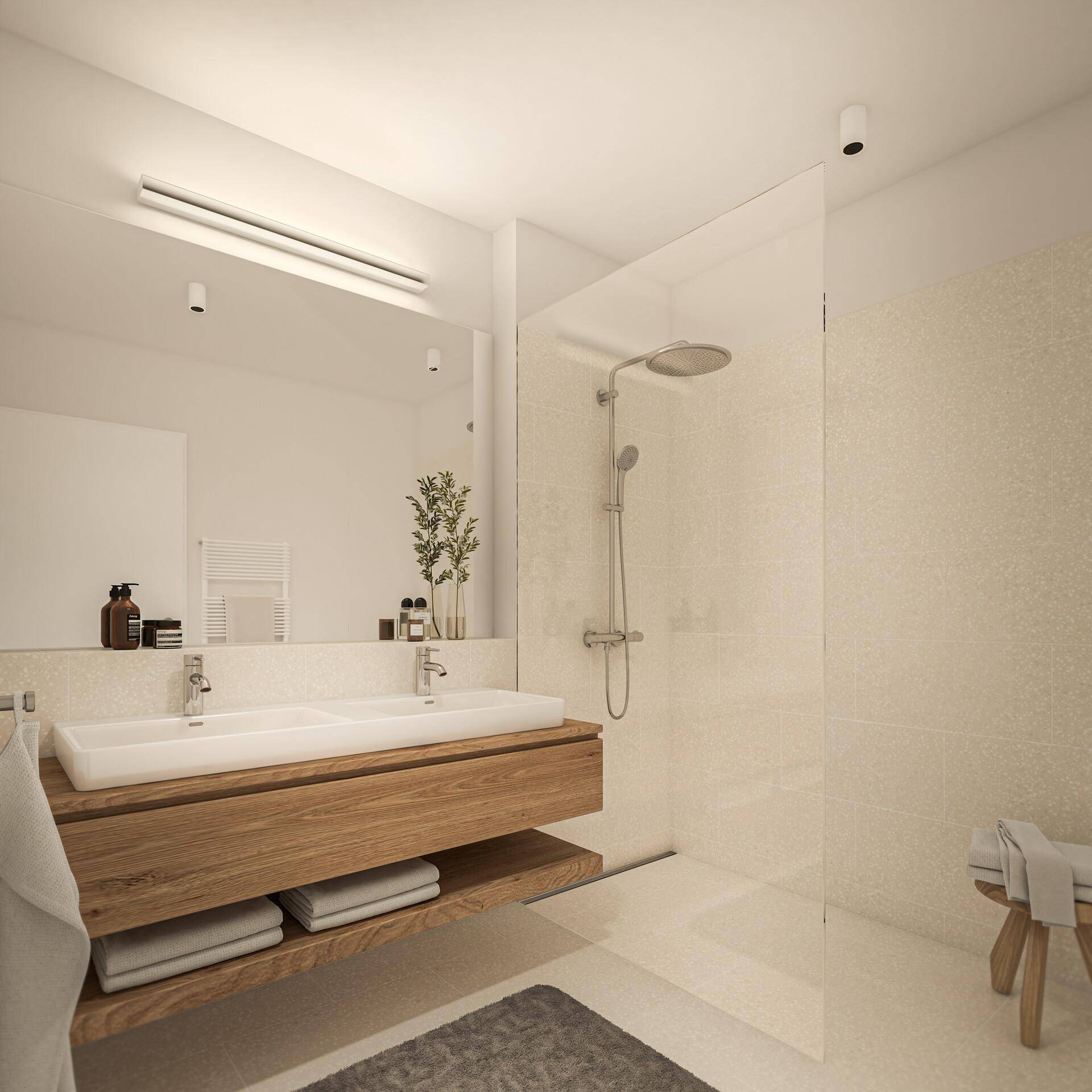 Modernes Badezimmer mit Doppelwaschbecken, großem Spiegel und ebenerdiger Dusche.