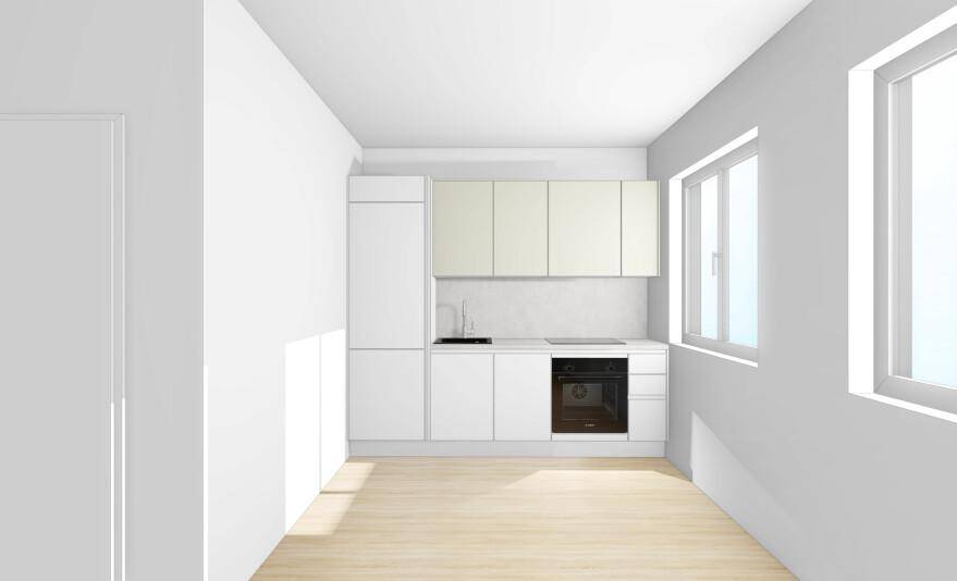 Leere Küche mit weißen Schränken, integriertem Backofen und zwei großen Fenstern.