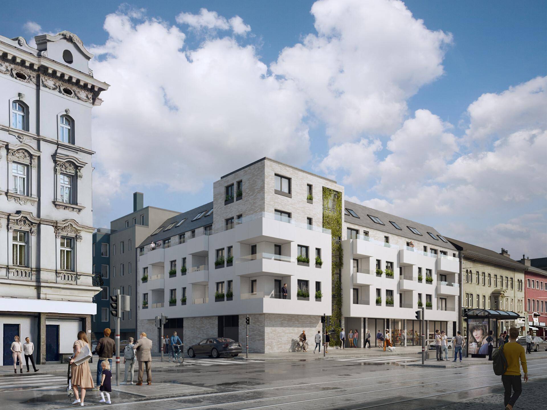 Modernes Gebäude an einer belebten Straße mit Geschäften im Erdgeschoss und vertikaler Begrünung an der Fassade.