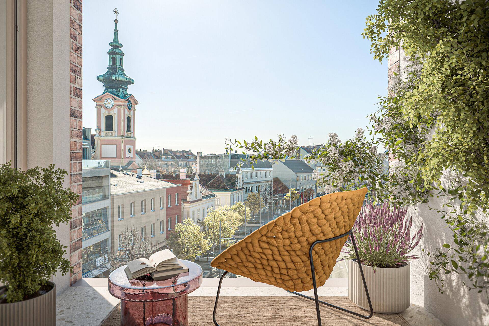 Gemütlicher Balkon mit Pflanzen, Sitzgelegenheit und malerischem Blick auf einen Kirchturm.