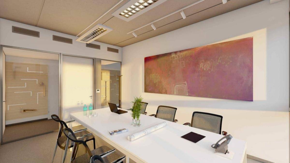 Besprechungsraum mit modernem Design, großem Tisch und farbenfrohem Kunstwerk an der Wand.