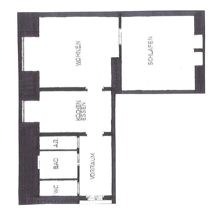 Handgezeichneter Grundriss mit separaten Bereichen für Wohnen, Schlafen und Kochen.