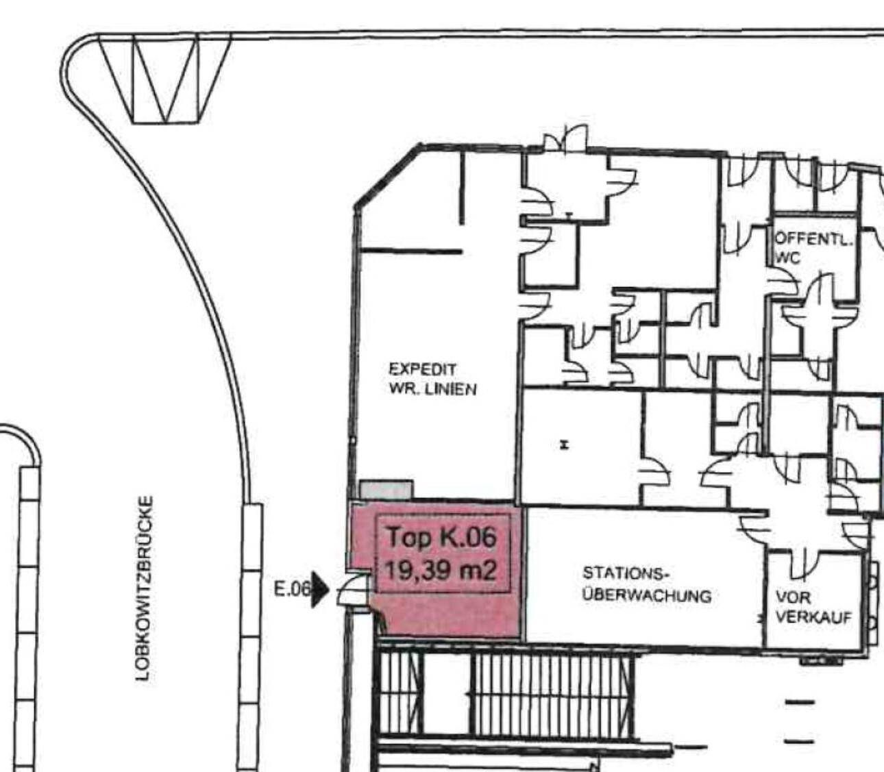 Grundrissplan zeigt eine Gewerbeeinheit (Top K.06) von 19,39 m² innerhalb eines größeren Gebäudekomplexes mit Treppenhaus.