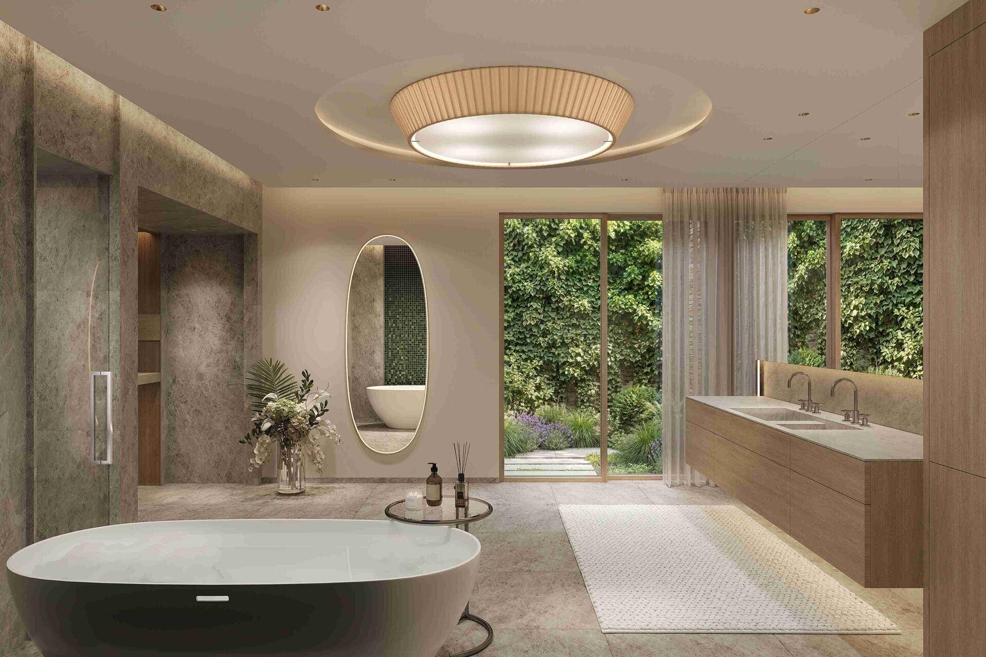 Luxuriöses Badezimmer mit freistehender Badewanne, Doppelwaschbecken und Zugang zum Garten.