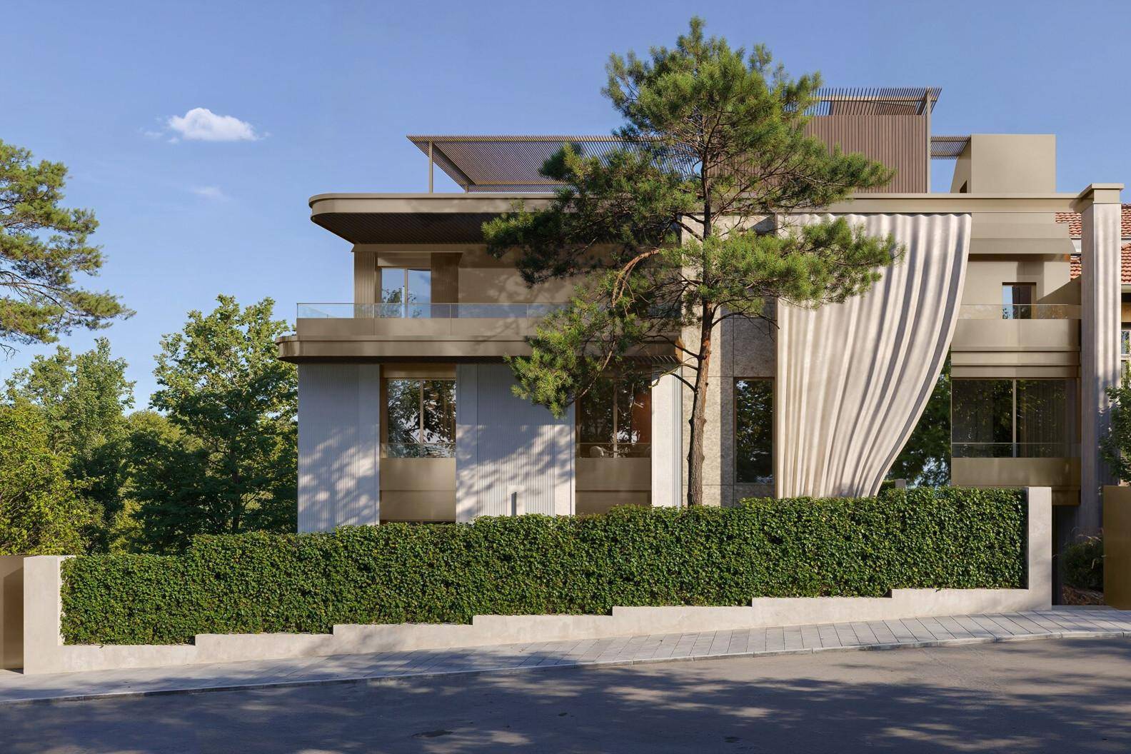 Elegante Fassade eines modernen Gebäudes mit großen Fenstern und gepflegter Hecke.