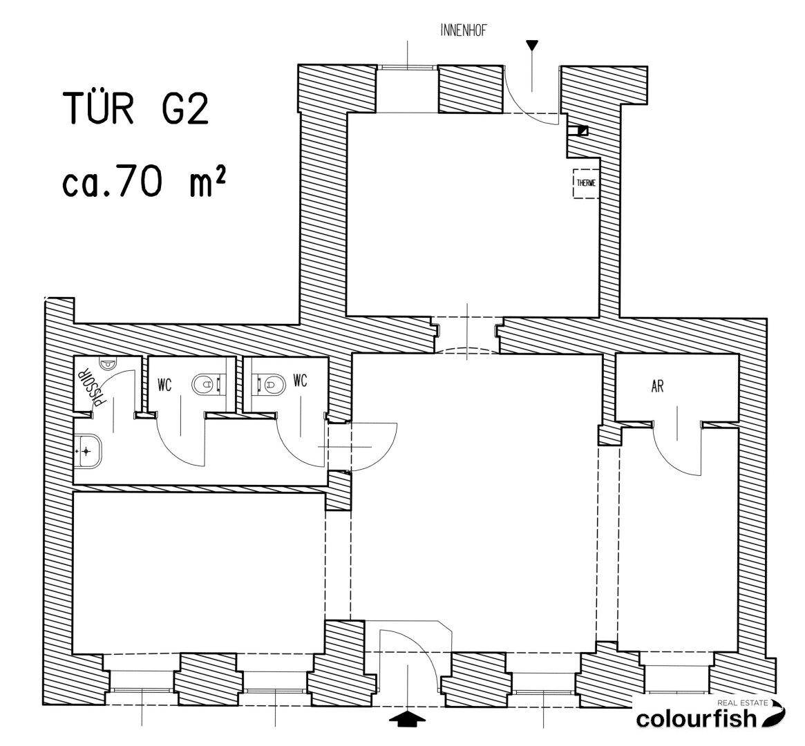 Grundrissplan einer Gewerbeeinheit mit zwei Toiletten, Abstellraum und Zugang zum Innenhof.